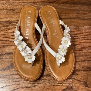 Beautiful white sandals with white flowers and crystals. Slight wedge on heel
